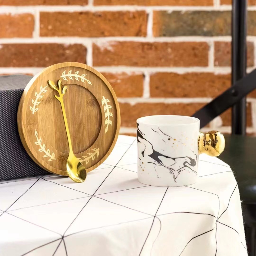Personalidad creativa marbling regalo Taza de cerámica y platillo taza de oro mango de cerámica nórdica taza de té de la tarde