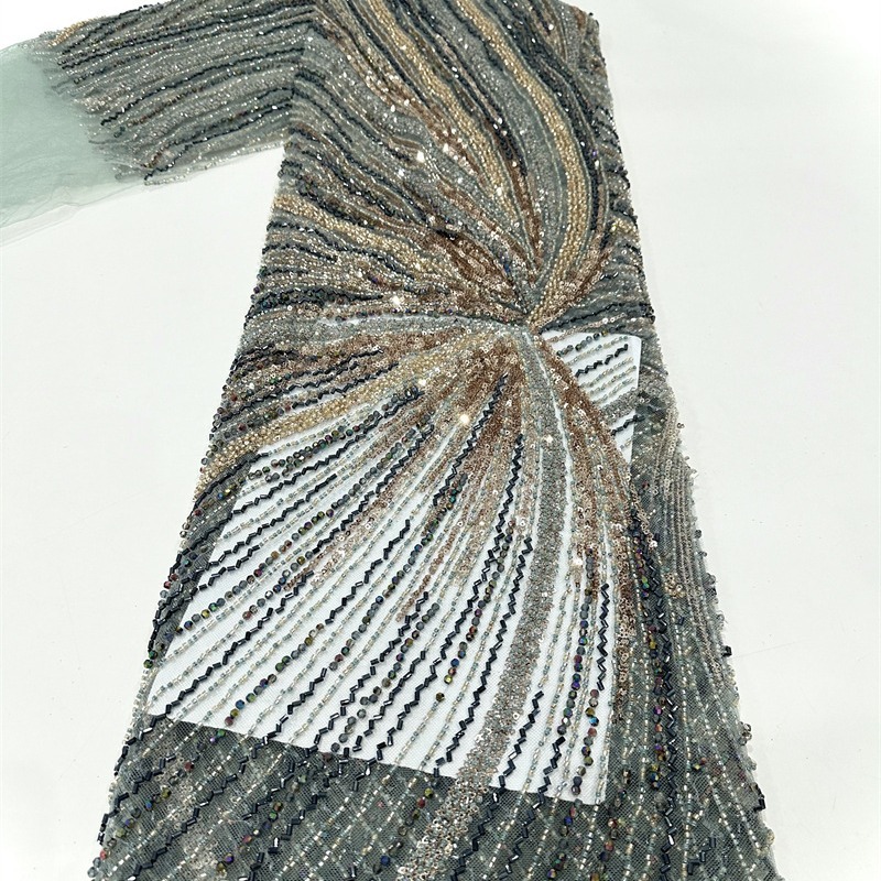 Tejido de malla de bordado de industria pesada bordado de tubo de perlas tridimensional vestido de boda cena tela de moda spot transfronterizo