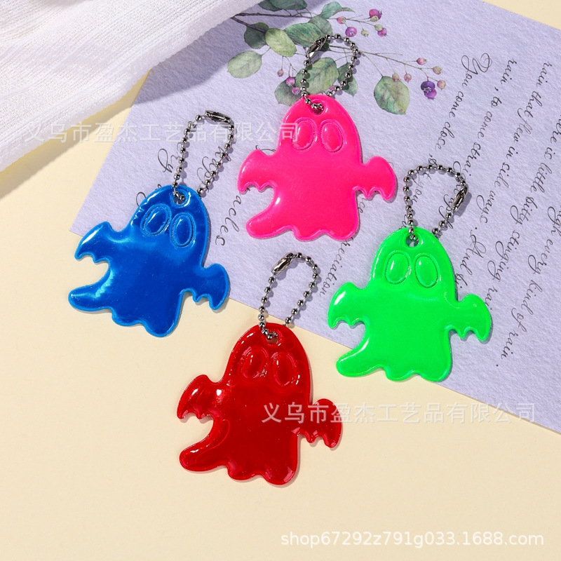 Amazon nuevo colgante transfronterizo pequeño estilo fantasma extraño lindo viaje nocturno llave reflectante de seguridad