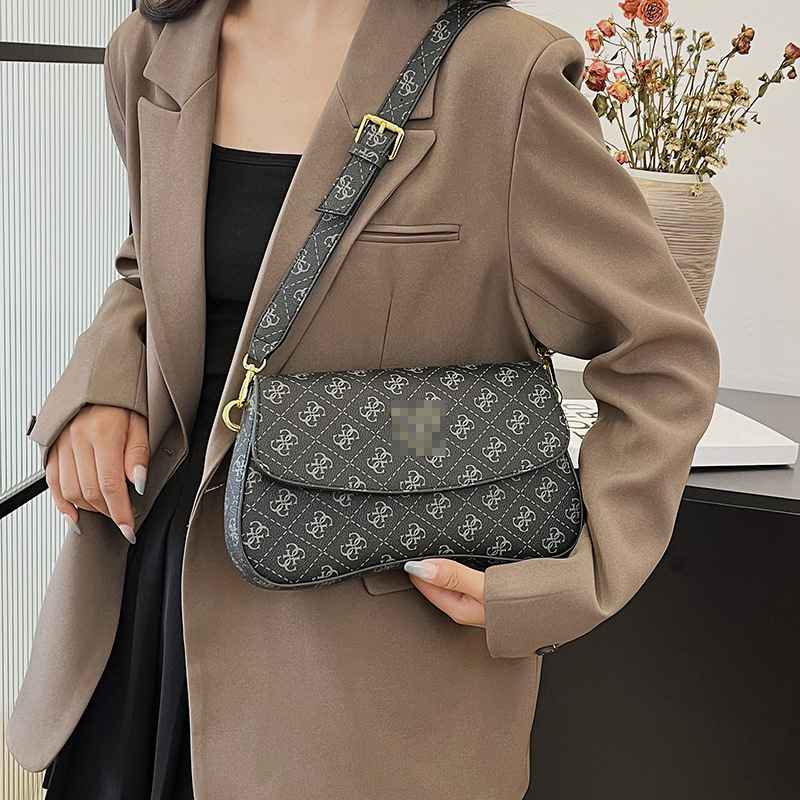 Bolsos transfronterizos para mujer 2024 nuevo estilo de alta gama bolso de axila de lujo simple y ligero con estampado de diamantes bolso de mensajero de todo fósforo