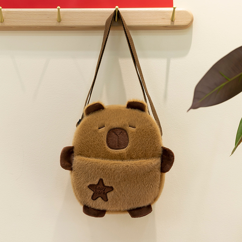 Venta directa de fábrica: bolsas de maquillaje de dibujos animados, muñecos de peluche, juguetes portátiles para niños, bolsos para mujer, muñecos de máquina de garras y otros productos.