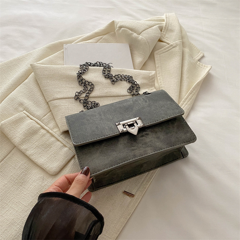 Bolsa de mochila de textura retro para mujeres 2024 nueva cadena coreana bolso cuadrado red rojo aire de viaje bolsa de hombro de moda