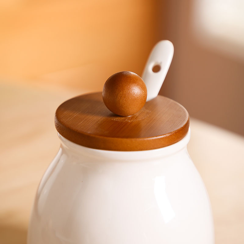 Tanque de condimento de cocina caja de condimento doméstica lata de sal botella de condimento de cerámica lata de condimento combinación conjunto de frasco de arroz y frasco de arroz