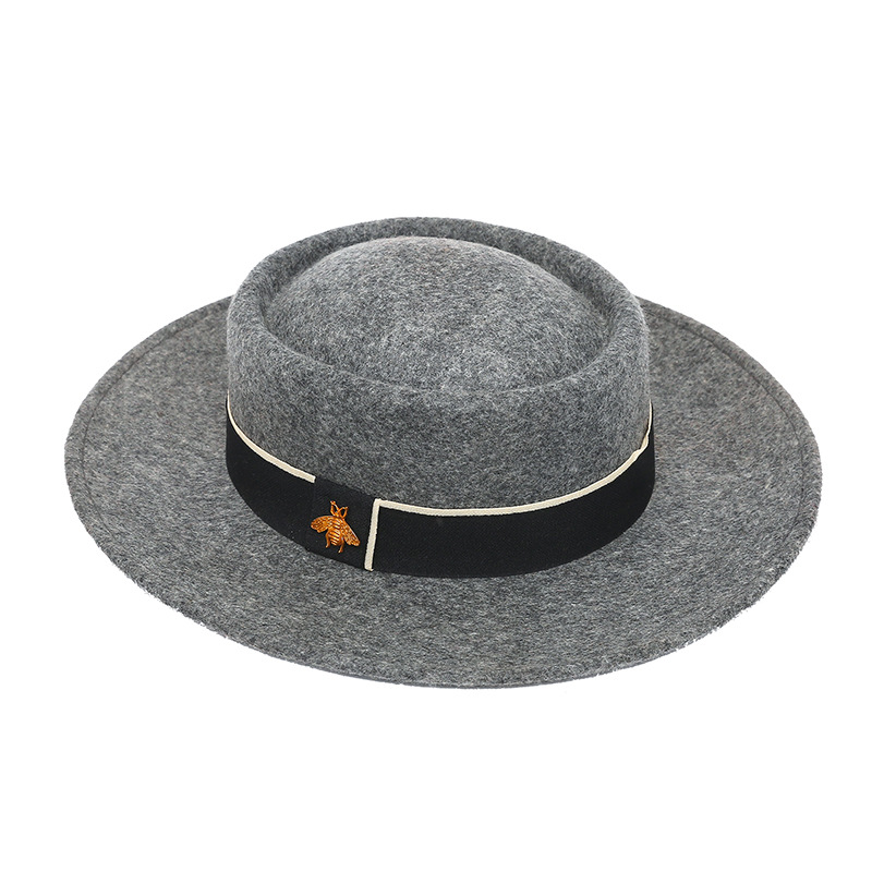 Sombrero de otoño e invierno lana pura cóncavo-cúpula convexa 8cm ala ancha sombrero de lana sombrero de fieltro de moda británica europea y americana al por mayor