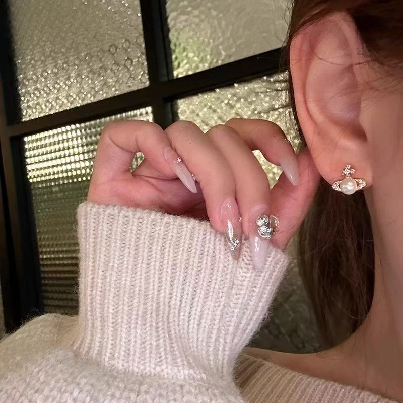 Coreano simple perla pendientes mujeres ins estilo de alta calidad nicho pendientes 2025 temperamento pendientes al por mayor