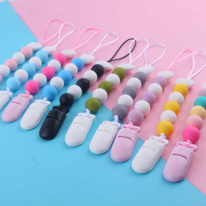 Nuevo bebé suministros de dibujos animados amor silicona DIY creativo macaron color serie mordedura cola molar pezón