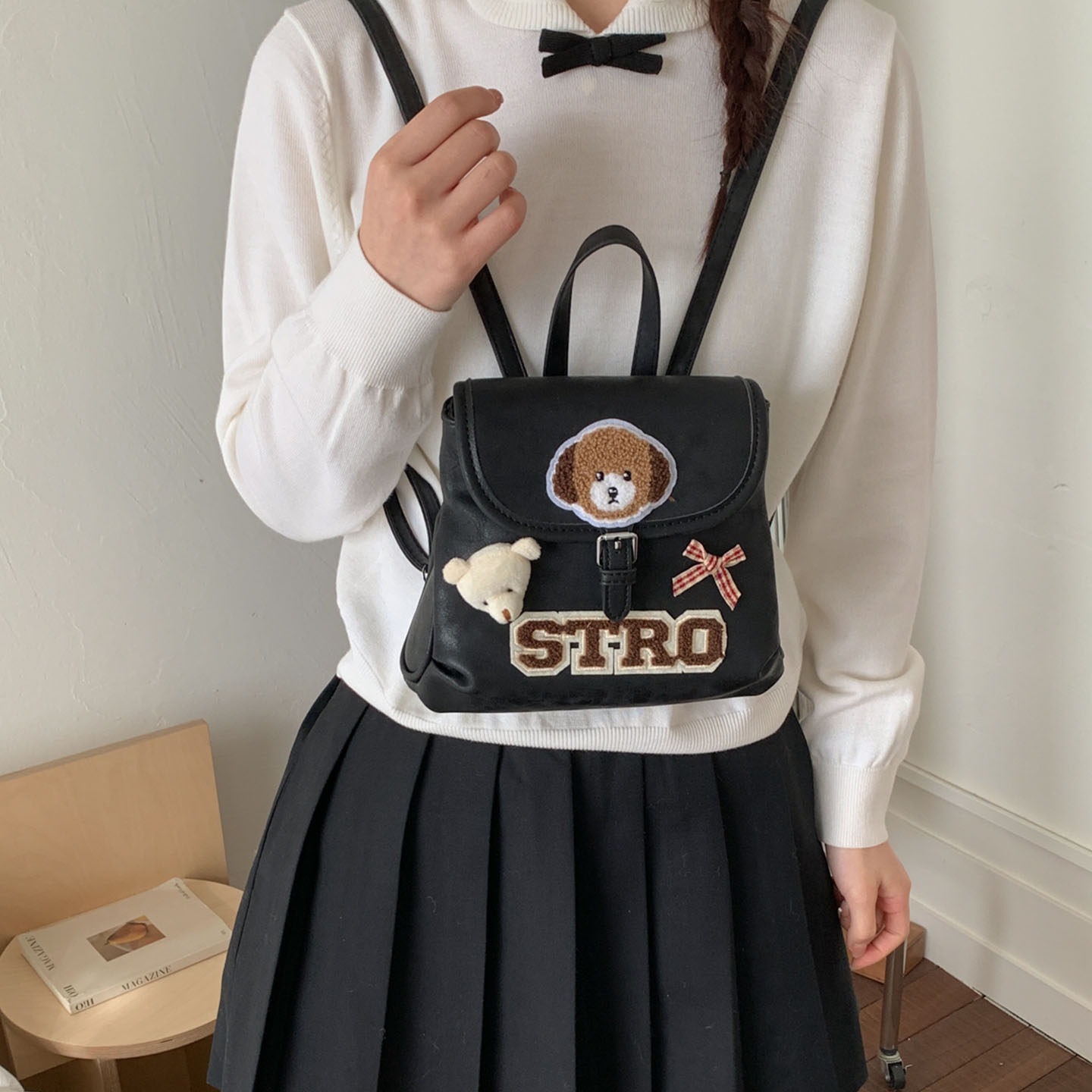Tide retro nuevo 2026 cachorro nicho de dibujos animados femeninos, mochila coreana, mochila encantadora de moda para viajar