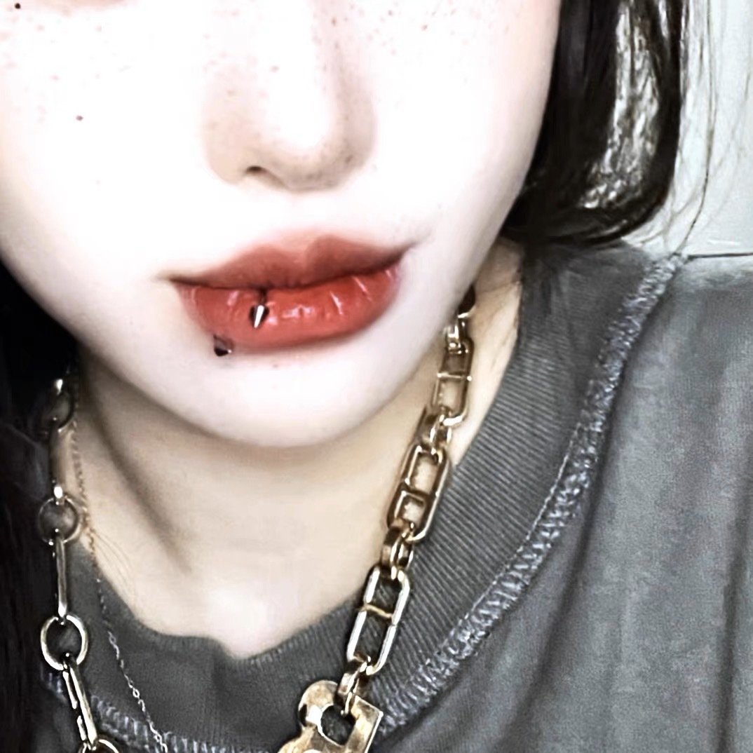 Labret stud lip piercing jewelry styling detail