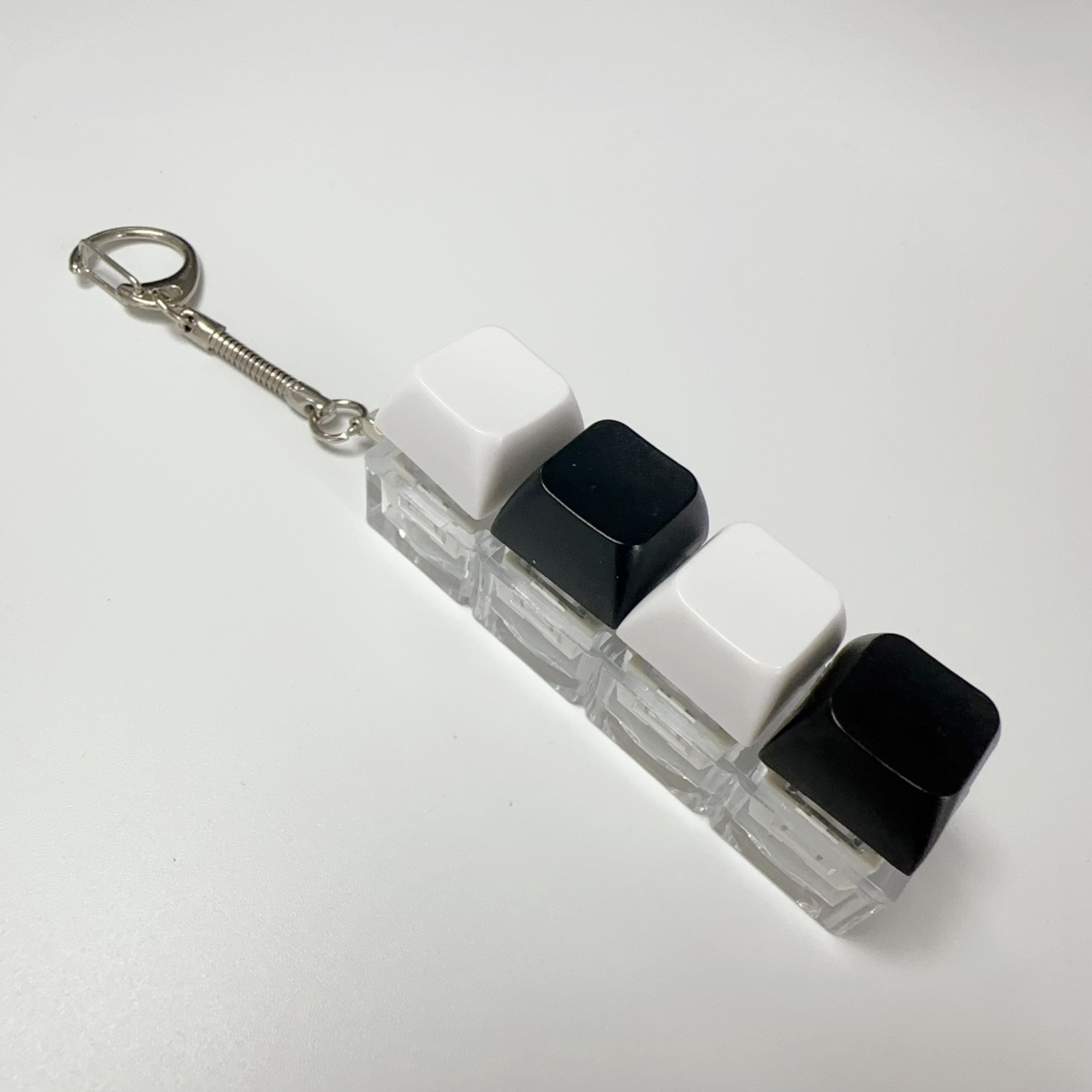 Four-button transparent shell - black