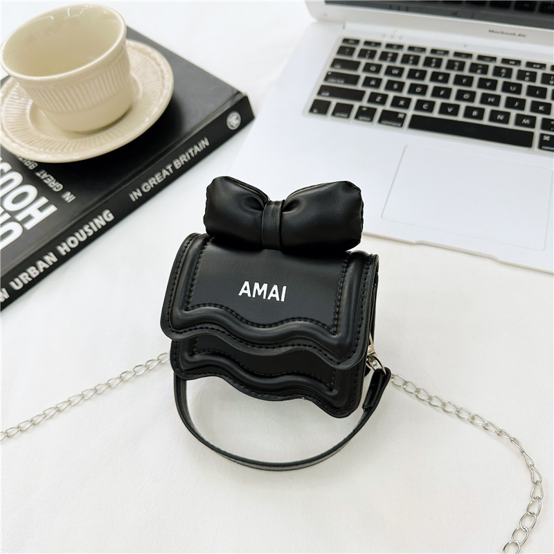 Primavera nuevo estilo coreano mini bolso de hombro de los niños pu arco cadena mensajero bolsa de hombro de las niñas bolsa padre-niño bolsa