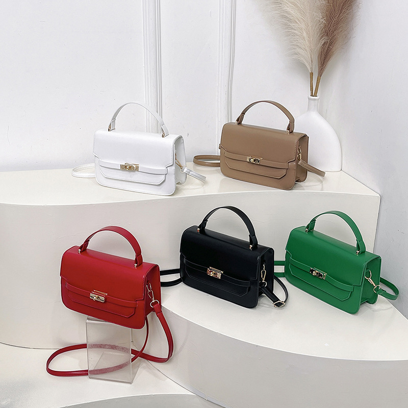 Bolso de mano de color sólido nuevo estilo 2025 simple bolso de hombro de primavera coreano de moda con cierre bolso pequeño