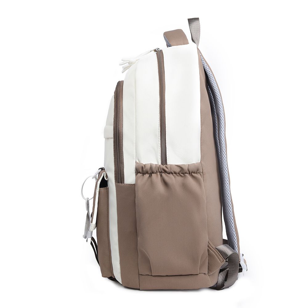 Nueva tendencia de la moda color de contraste mochila de gran capacidad impermeable para estudiantes universitarios de secundaria y preparatoria mochila de viaje ligera al por mayor