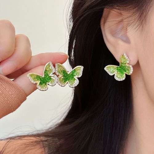 Zhao Lusi's same style green crystal butterfly earrings niche design mosquito coil disc ear clip