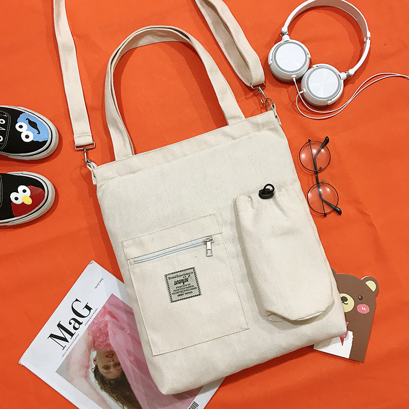 Bolsa de lona de las mujeres bolsa de mensajero estudiante japonés ins estilo bolso de hombro coreano simple todo-fósforo bolso de gran capacidad