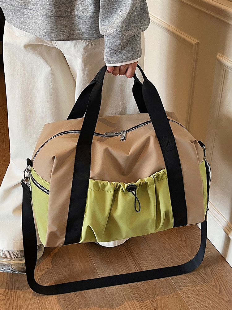 Bolsas deportivas de gran capacidad de ocio, bolsas de viaje de hombro simples de moda para mujeres, bolsas de mano ligeras de tirado.