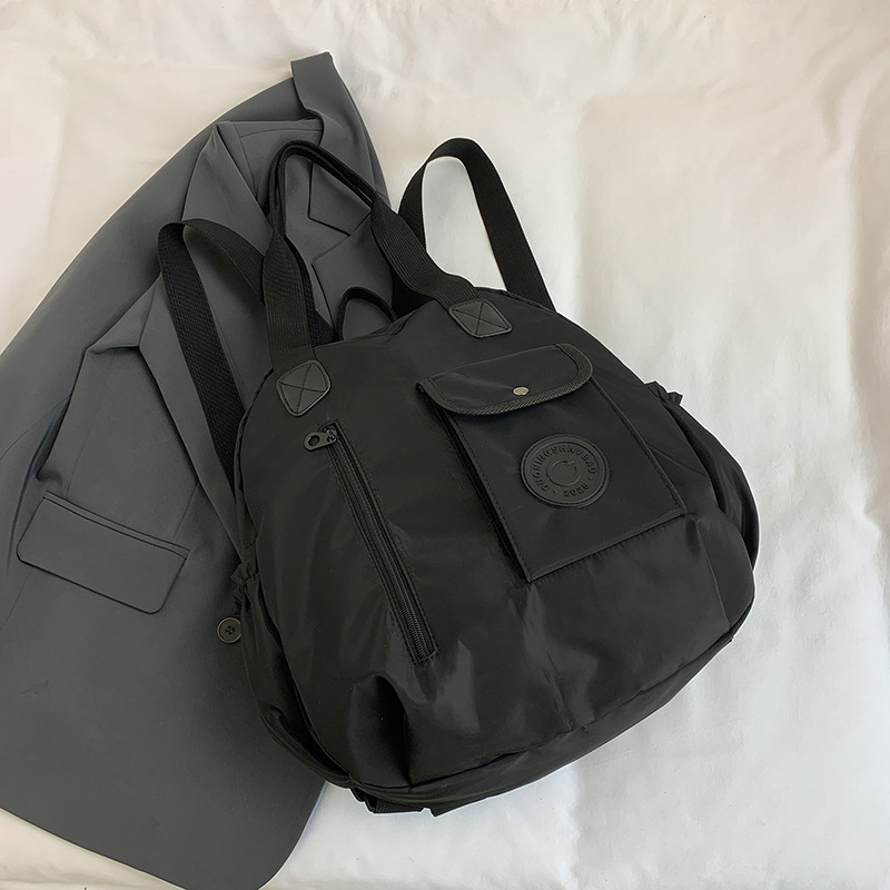 Otoño nuevo estilo de alta sensación compacto simple versátil gran capacidad viaje mochila de hombro bolsa multipropósito hombro