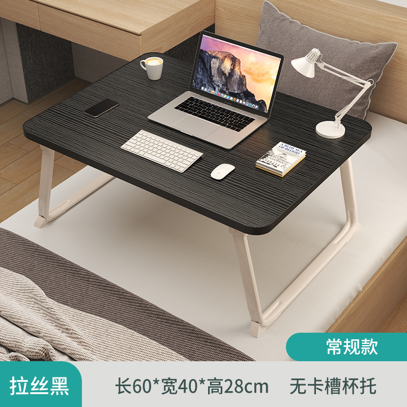 昇降可能な折りたたみ式ベッドの上の小さなテーブルは簡単です。|undefined