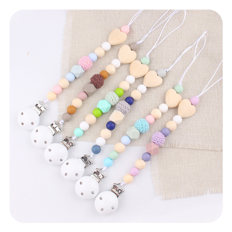 Productos para bebés y niños pequeños grano madera amor DIY tetina cadena calmar bebés perlas de silicona mordida goma molar cadena de prevención