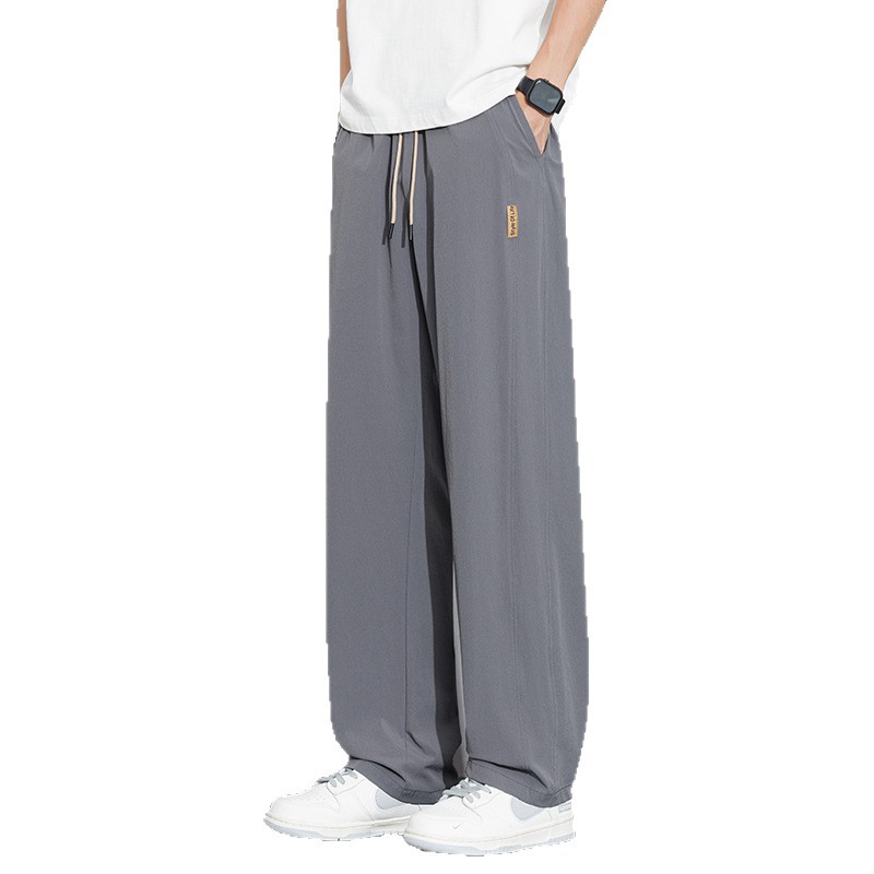 Pantalones casuales recto de tamaño grande para hombres 2026 nuevo verano delgado hielo suelto para aumentar el peso de los pantalones deportivos para hombres