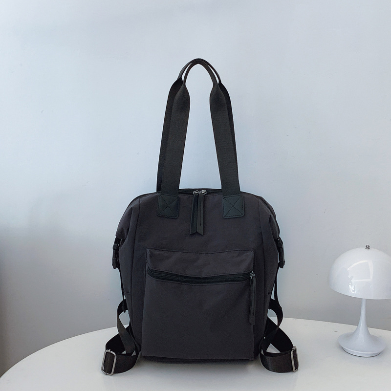 Bolsa de mano de gran capacidad 2025, nueva mochila de moda japonesa, mochila de hombro de estudiantes universitarios, mochila ligera, moda