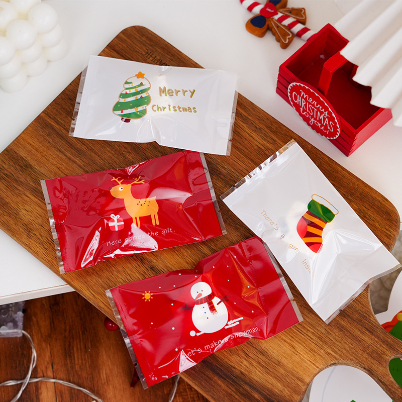 2022年新款圣诞节四合一款机封袋小包装袋圣诞棒棒糖雪花酥礼物袋