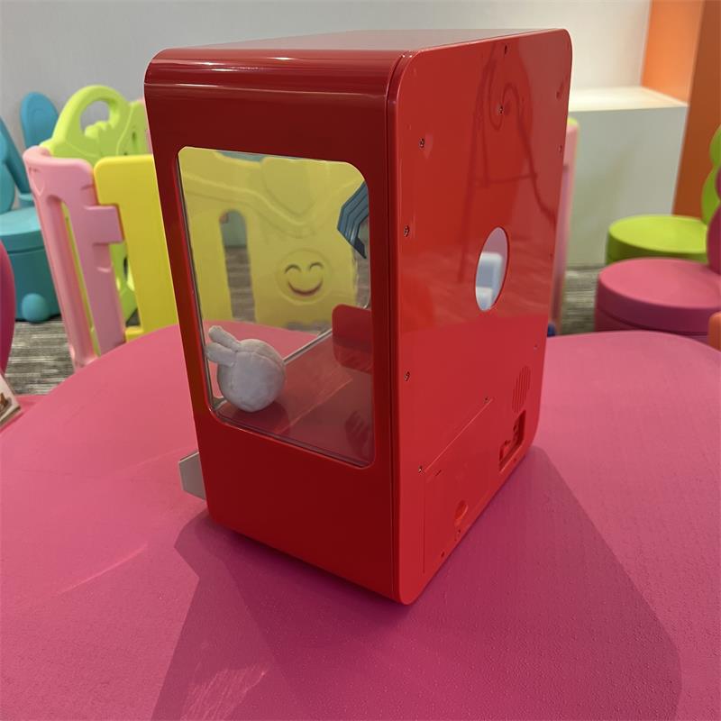 Máquina de agarre de muñeca para niños 959 muñeca que funciona con monedas pequeño hogar huevo torcer caramelo máquina de muñeca para niños eléctrica