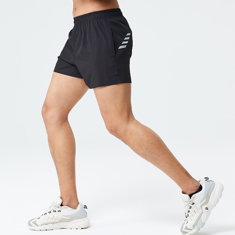 Verano maratón profesional de los hombres corriendo entrenamiento pantalones cortos deportivos de una sola capa de fitness ligero de secado rápido tres pantalones en stock