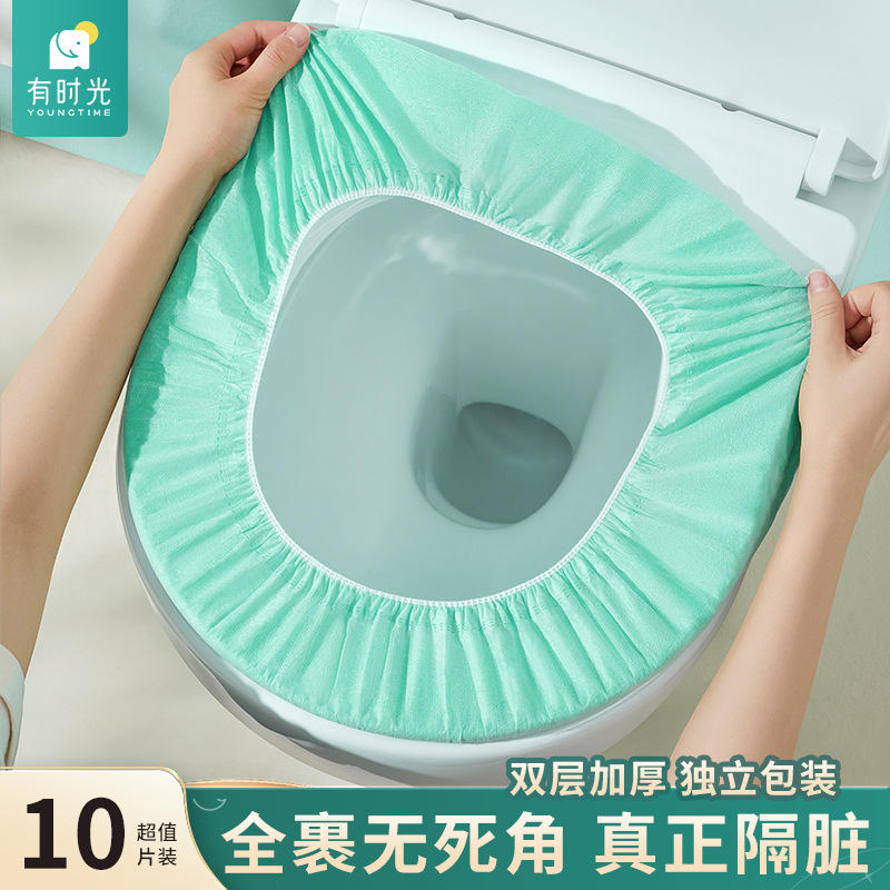 A disposable, thickened, and oversized toilet seat cover with a full coverage design, suitable for travel, and individually packaged, 10 pieces per pack.