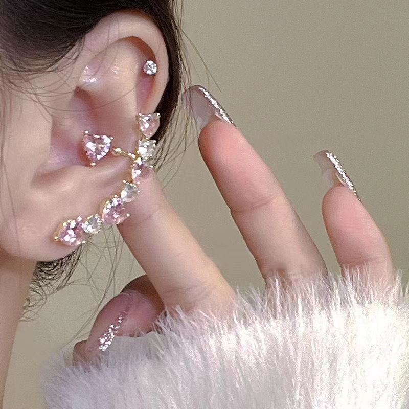 Asymmetrical small design earrings heart-shaped