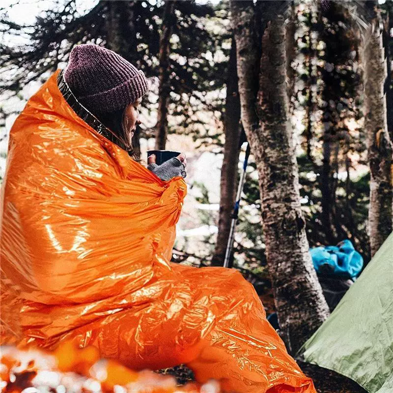 Travel sleeping bag, thermos, windproof raincoat