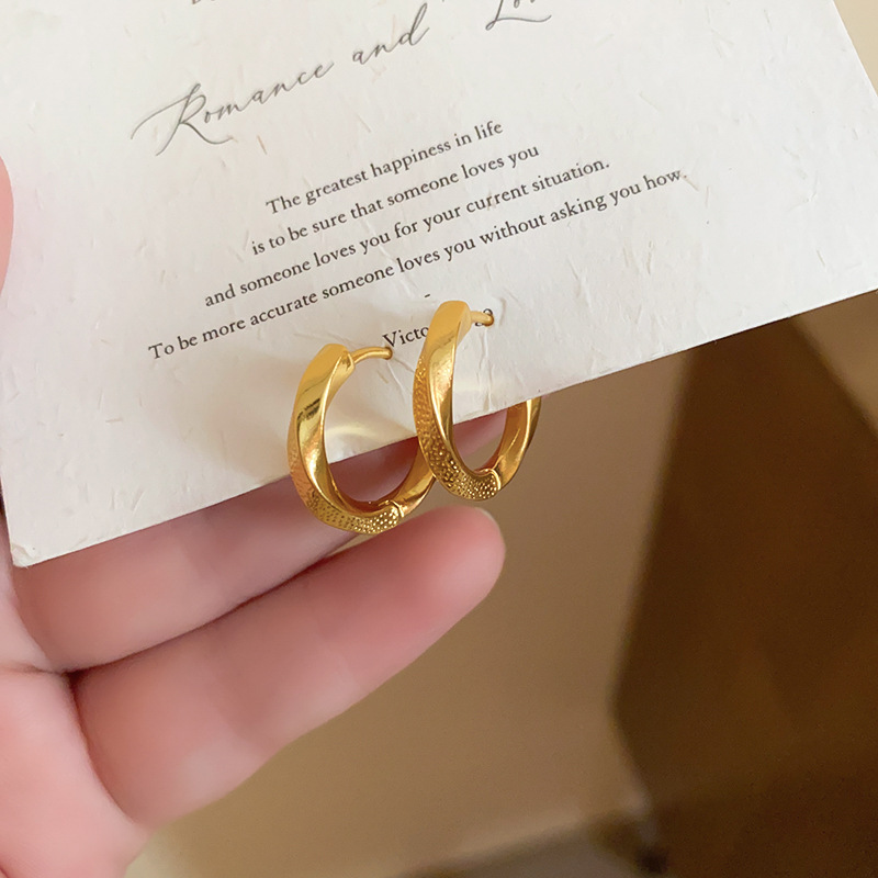 Pendientes de metal transfronterizos de otoño e invierno con aguja de plata, pendientes, pendientes de viento frío de moda de nicho, pendientes de lujo de alta gama de luz de todo fósforo