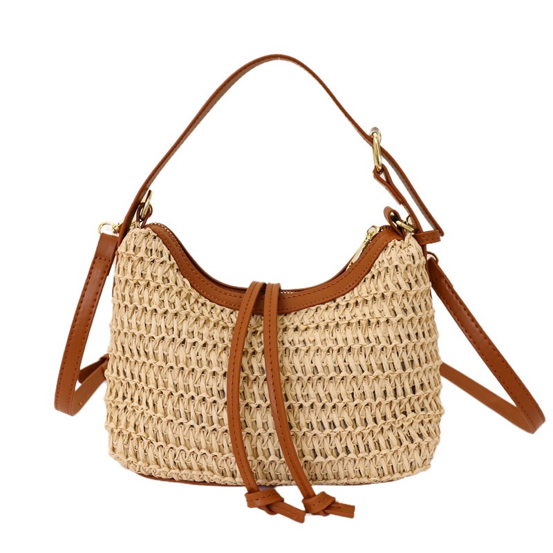 Nicho Zhong vacaciones de verano bolsas de paja nuevas bolsas de mano de viaje de mujer ocio diario viaje de viaje temperamento bolsas de cubo caqui