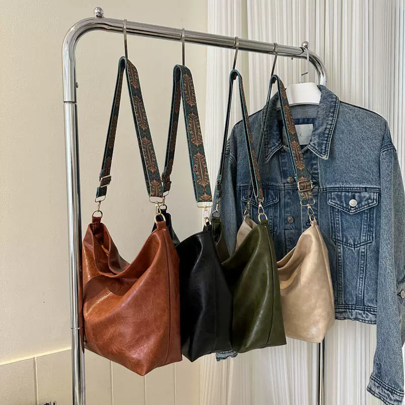 大容量包包女2025春夏新款复古宽带单肩斜挎包高级质感通勤水桶包