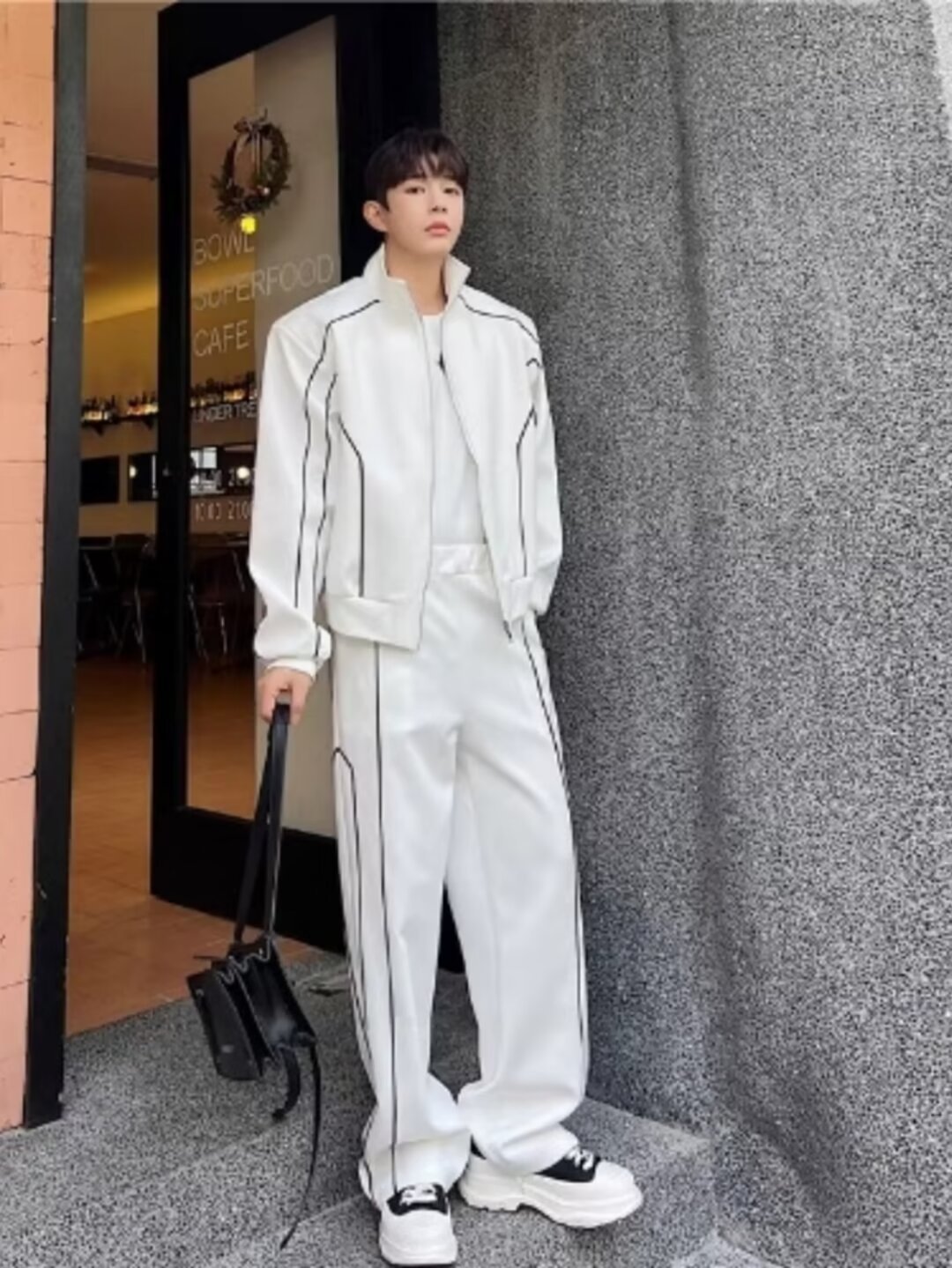 Ropa de primavera, línea clara, dos piezas, un conjunto de pantalones de cuello vertical, un conjunto de pantalones de piernas largas relajadas y deportivas.