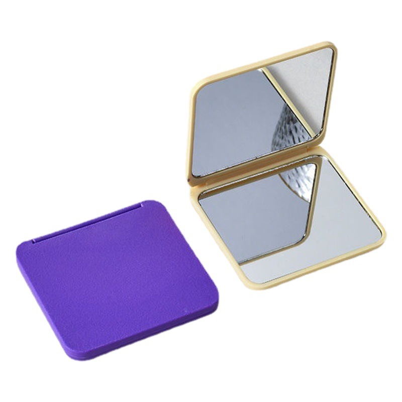 Espejo pequeño portátil mini espejo de maquillaje portátil de doble cara dormitorio de estudiantes espejo plegable de mano hogar hembra
