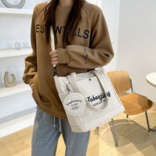 大容量单肩背包帆布百搭妈咪包包女新款时尚托特包学生上课通勤包