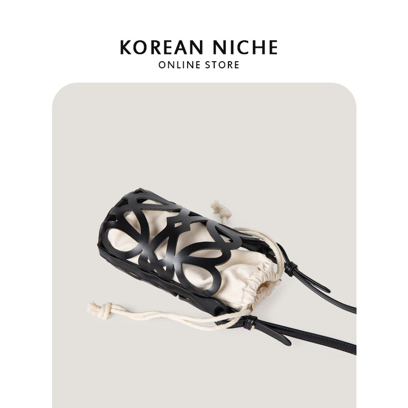 Bolso de mujer 2022 nuevo diseño de nicho hueco cordón lienzo cilindro pequeño bolso personalizado retro crossbody bolso de hombro