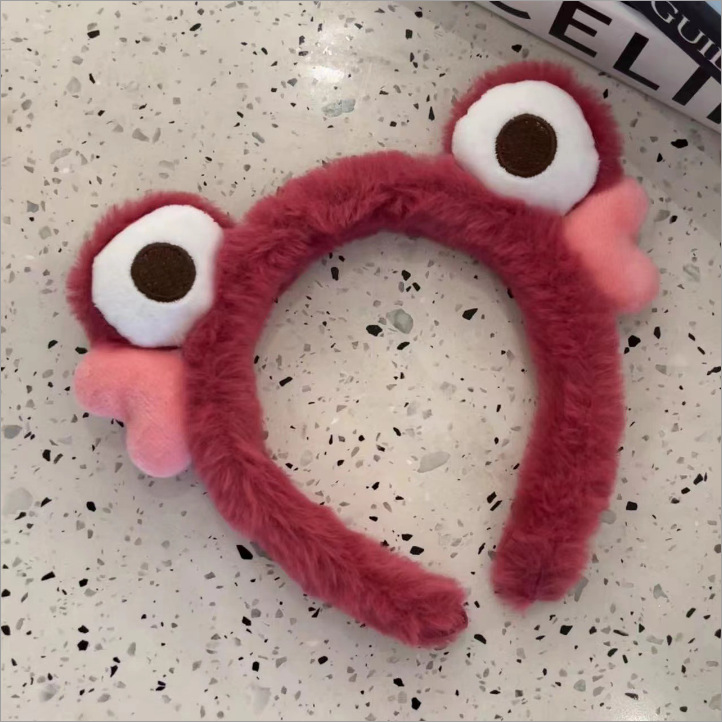 Rana de peluche rosa roja