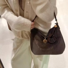 南枫时尚潮流吉袋衔金水桶包2025巨好看包包女新款手提单肩斜挎包