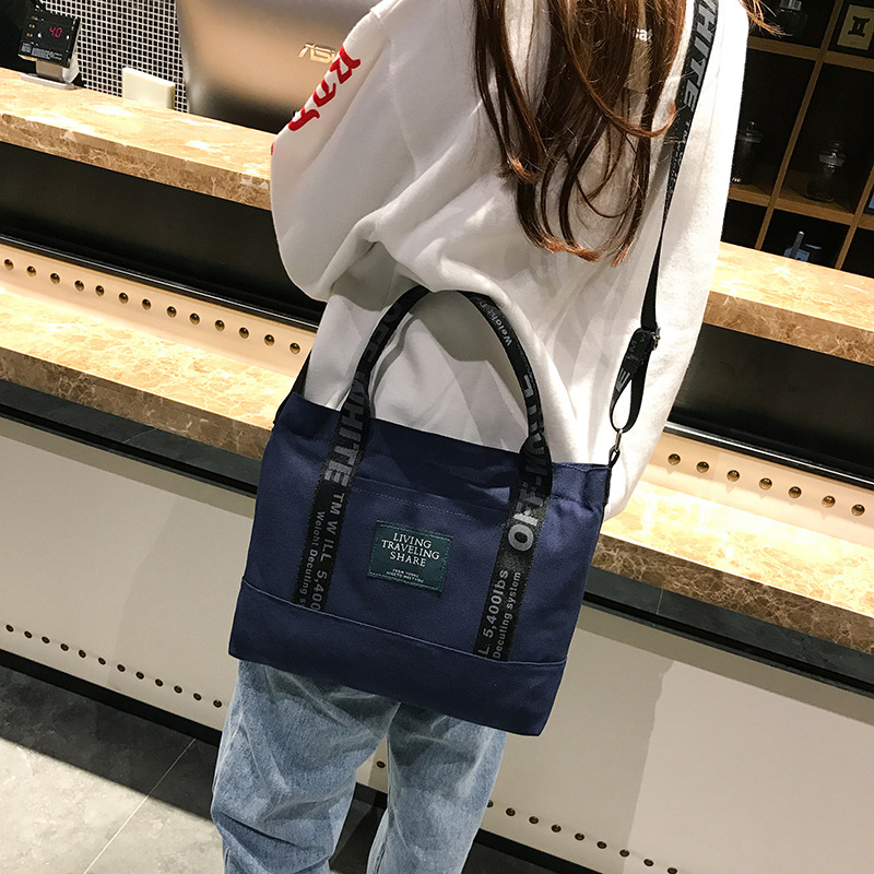 Versión coreana del bolso japonés fresco para mujer, bolso de lona, bolso de mensajero portátil de un solo hombro grueso, bolso popular de estilo literario
