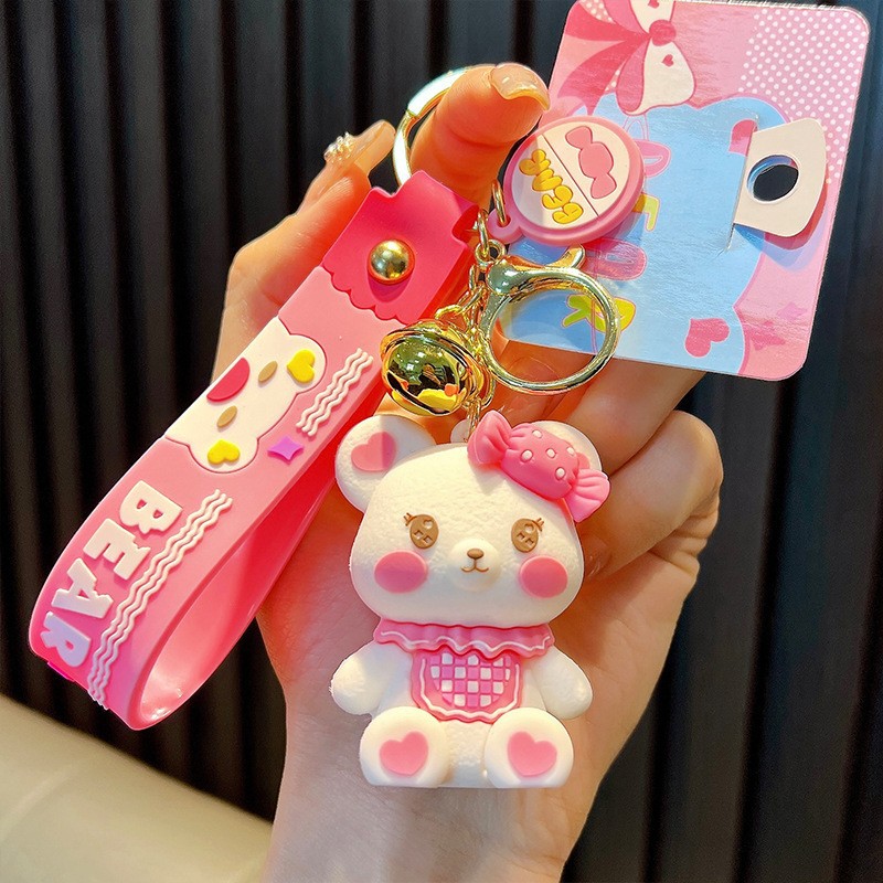 Keychain dinosaurio auténtico lindo bolso colgante de goma blanda llavero de automóvil muñeca pequeña máquina de regalos al por mayor image 20