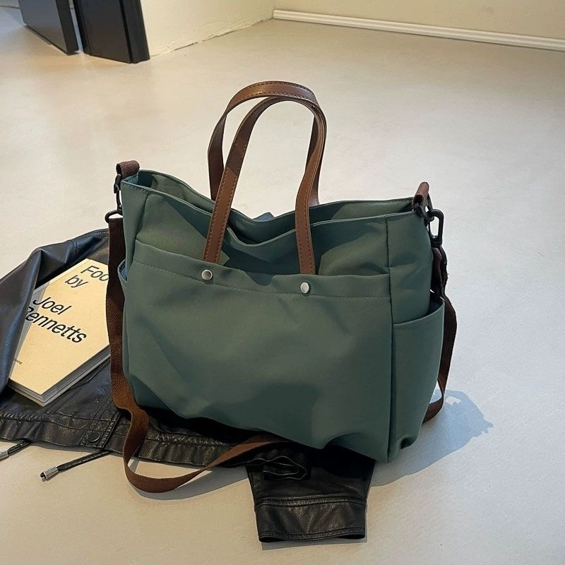 Universal laptop, handheld capacious purse one shoulder