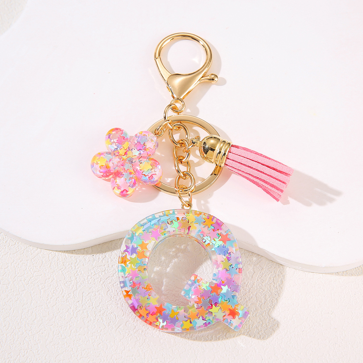 Un nuevo llavero flor de goteo de goma esquinilla 26 letras bolsos colgante llavero accesorios Yiwu