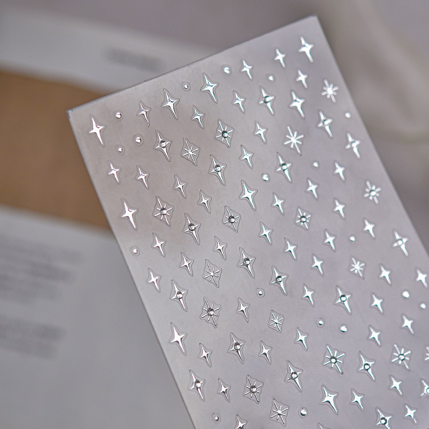 Pegatinas de uñas de cristal Tomoni, exquisitos accesorios pequeños, pegatinas de uñas con diseño de estrella plateada metálica láser, pequeñas pegatinas para la nariz