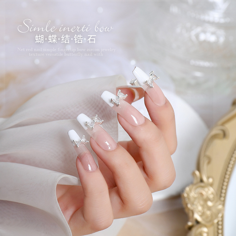 En LÍNEA DE MANICURA de la celebridad francés arco tridimensional uñas fototerapia avanzada cristal decorativo tamaño pequeño metal joyería diamante circón