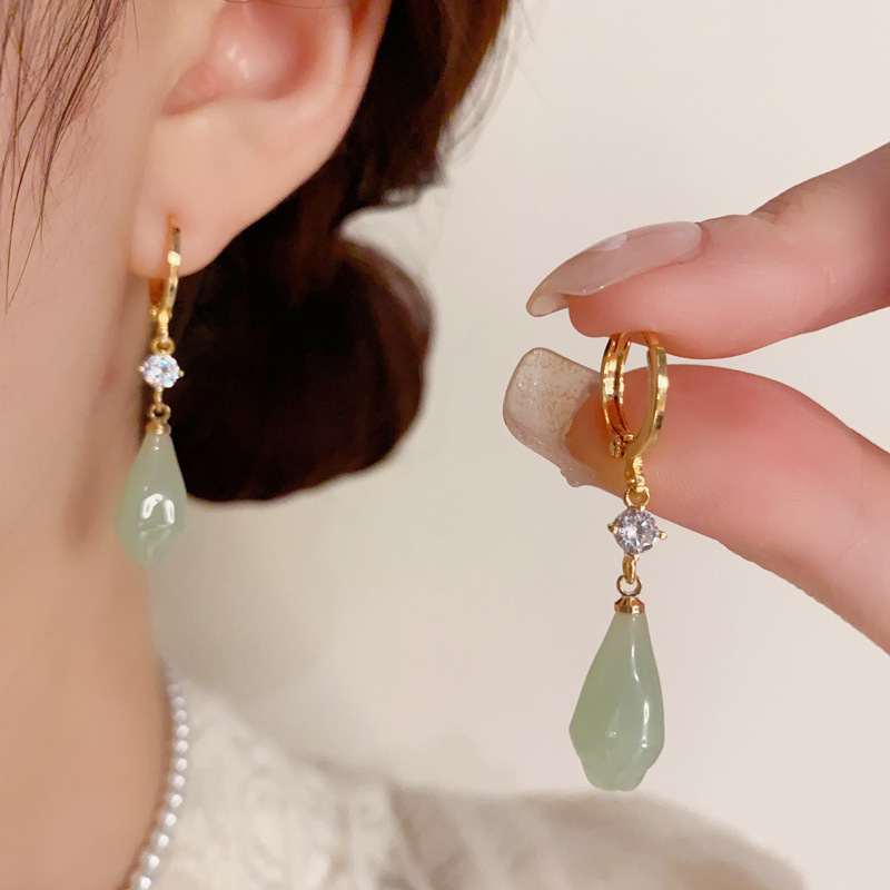 Small design fashionable retro green earrings with tassels