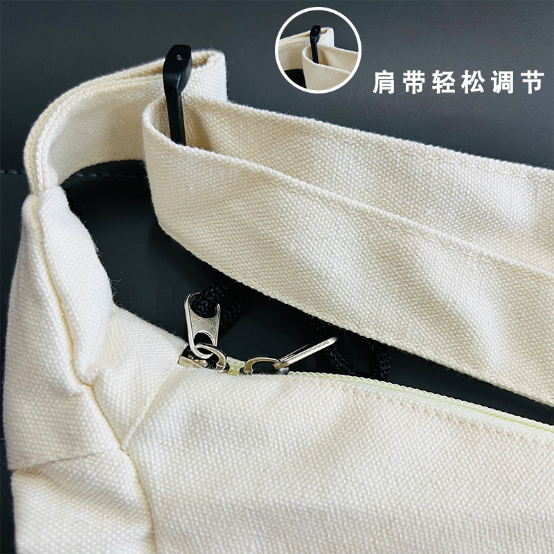 Fabricante nuevo lienzo bolsa de mensajero de los hombres y las mujeres del mismo estilo ins nicho versátil gran capacidad moda Commuter dumpling bolsa