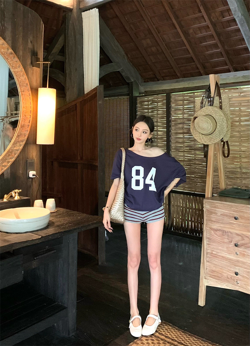 Copy_Navy blue printed slanted shoulder short-sleeved T-shirt for women in summer, lazy and loose American style.jpg