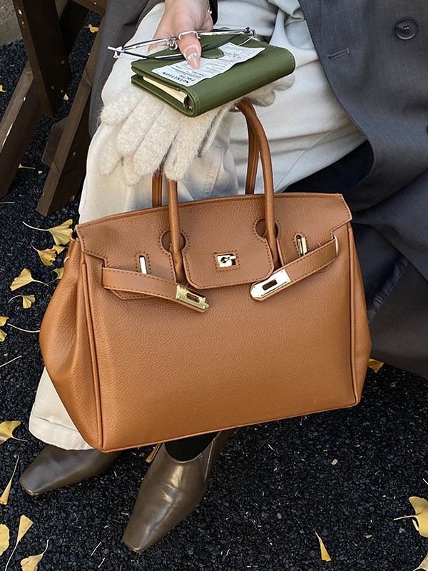 Bolsos de platino retro retro de alta calidad para mujeres 2026 comercio exterior nueva moda litchi pattern commuter mochila versátil