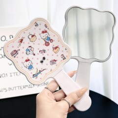 自転車に乗るケイティの取っ手の鏡は櫛の高級な便利な化粧鏡の少女の心の小さい鏡を持って化粧鏡を持ちます。
